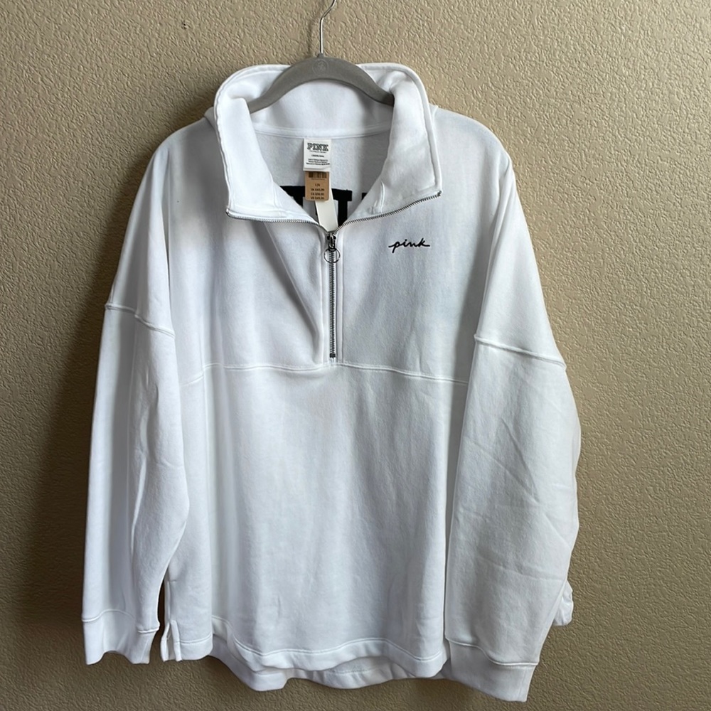 Pink half zip up sweatshirt